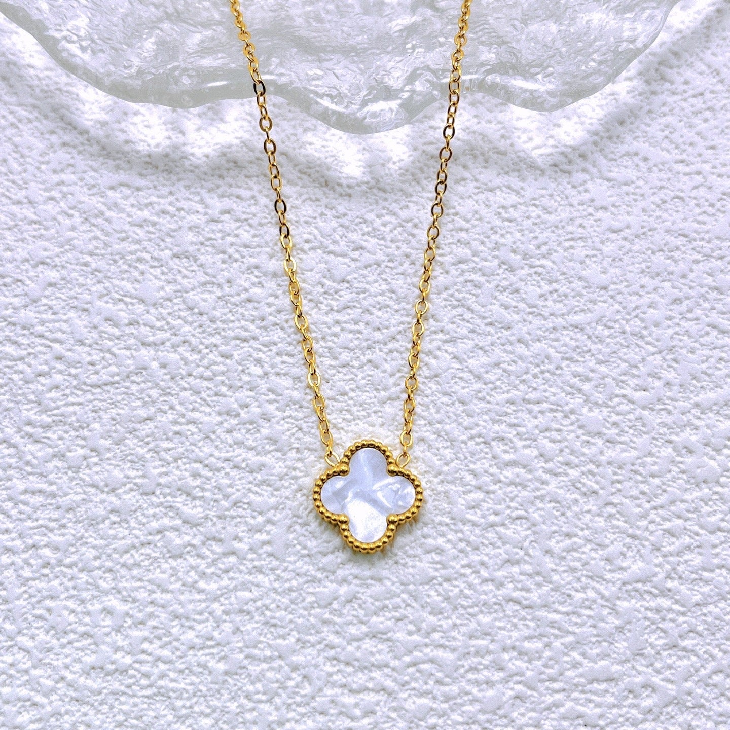 Black and white double-sided four-leaf flower necklace 2025081302